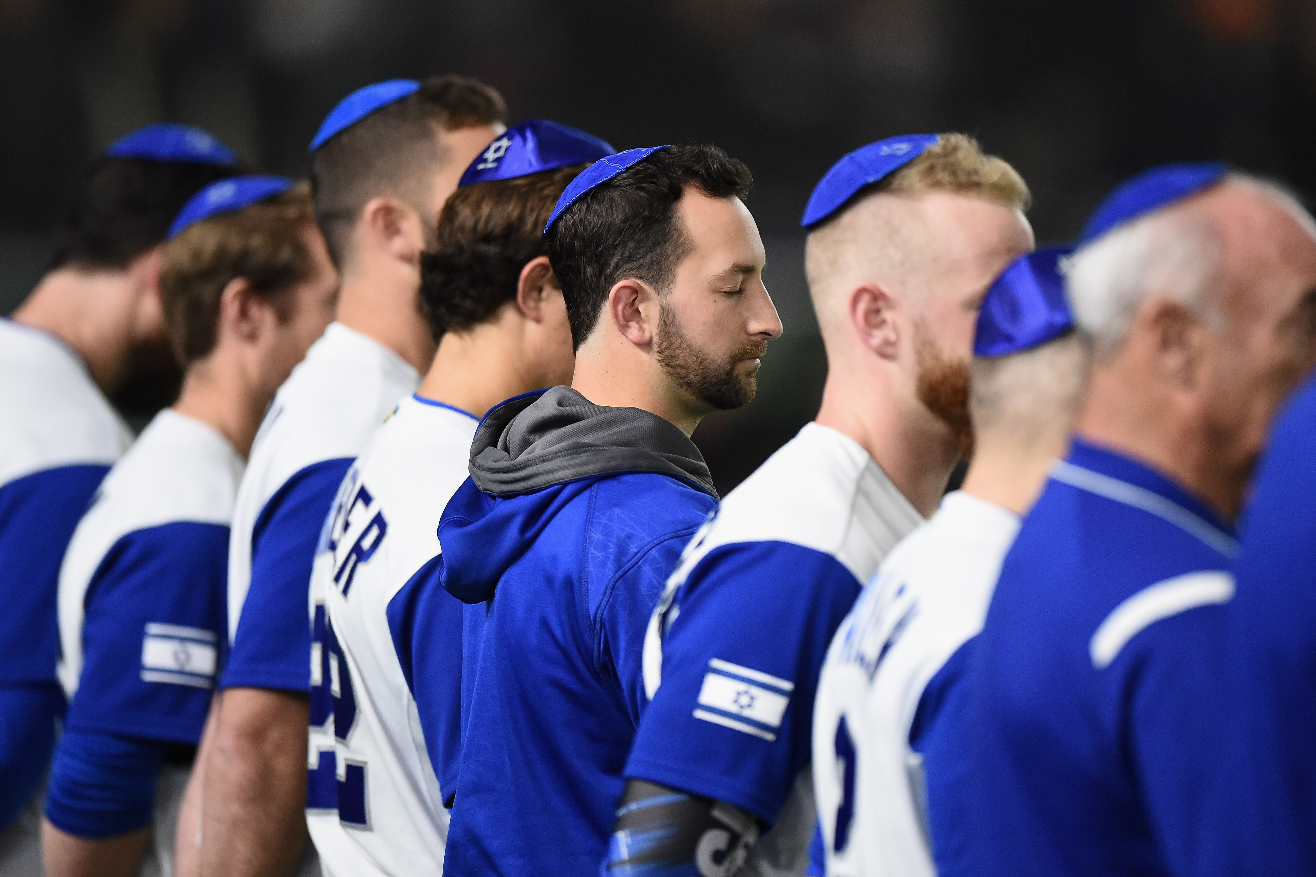 Team Israel players line up for the national anthem prior to their World Baseball Classic game against the Netherlands in Tokyo, March 13, 2017. (Matt Roberts/Getty Images)