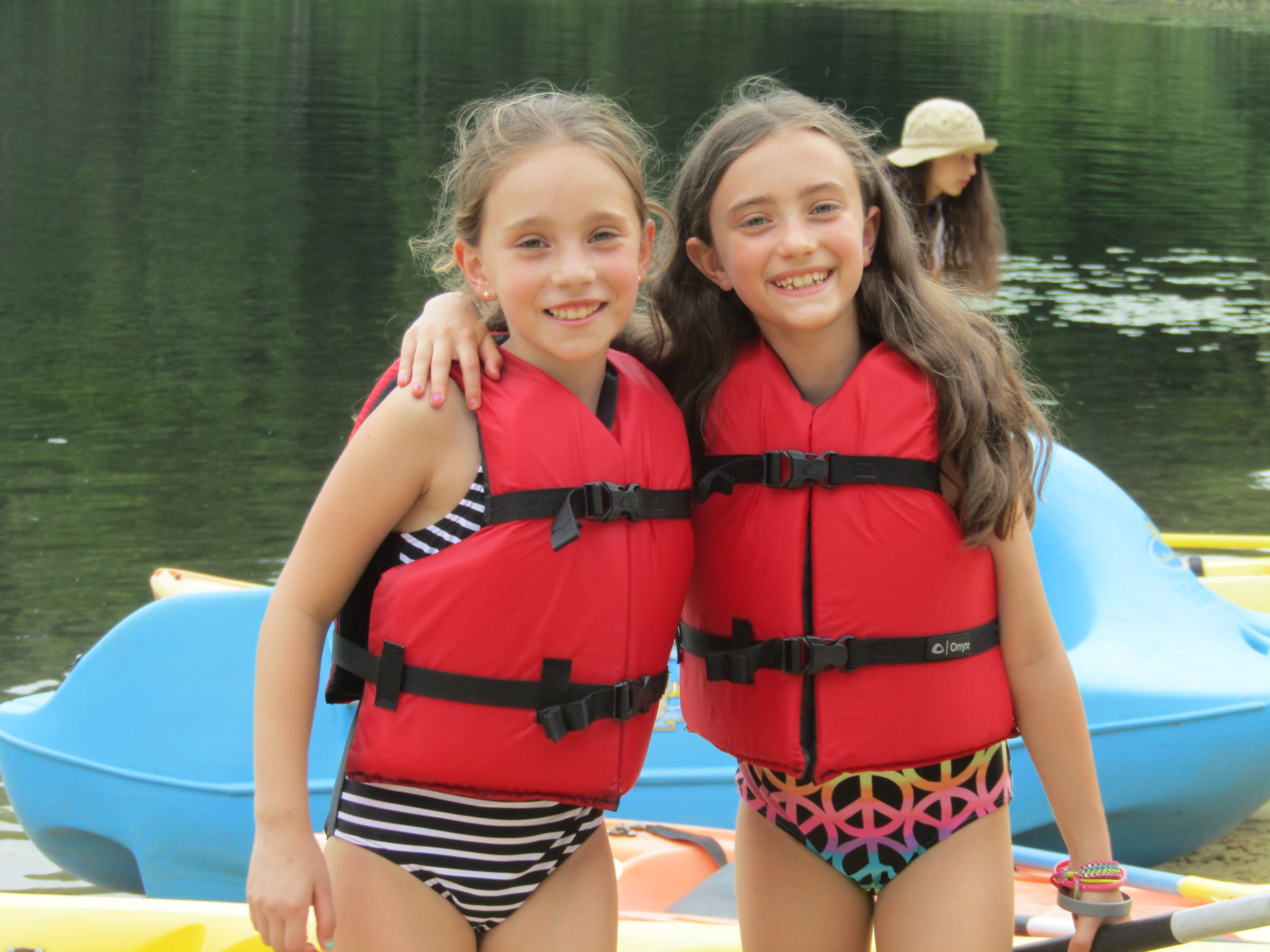 Two young campers at Camp Ramah in the Berkshires enjoy the waterfront. At the camp, those entering third grade can try out a seven-day session. (Courtesy of Camp Ramah in the Berkshires)