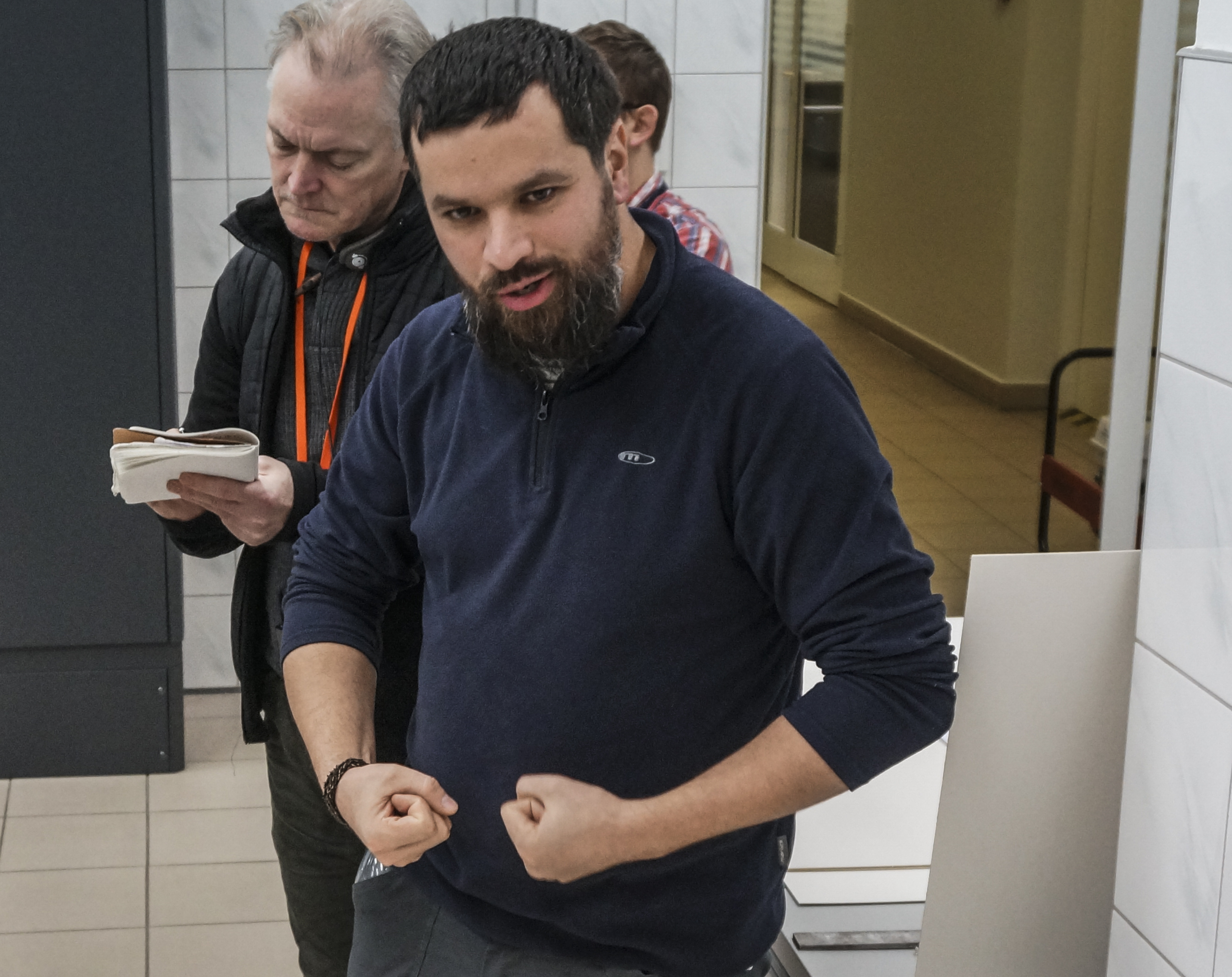 Pawel Sawicki showing journalists the lab of the Auschwitz-Birkenau museum, Nov. 30, 2016. (Cnaan Liphshiz)