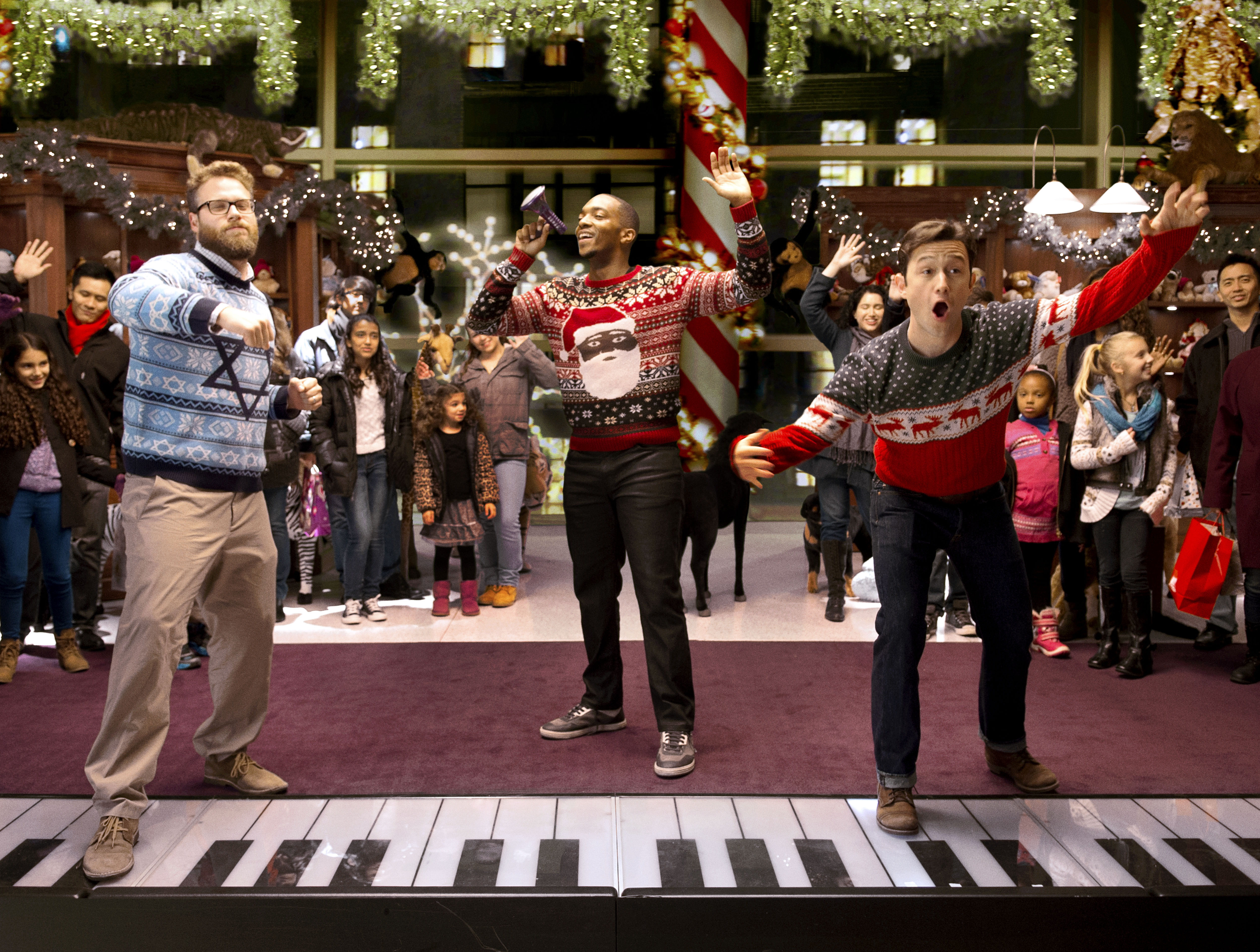 From left, Seth Rogen, Anthony Mackie and Joseph Gordon-Levitt star in Jonathan Levine's "The Night Before." (Courtesy of Columbia Pictures)