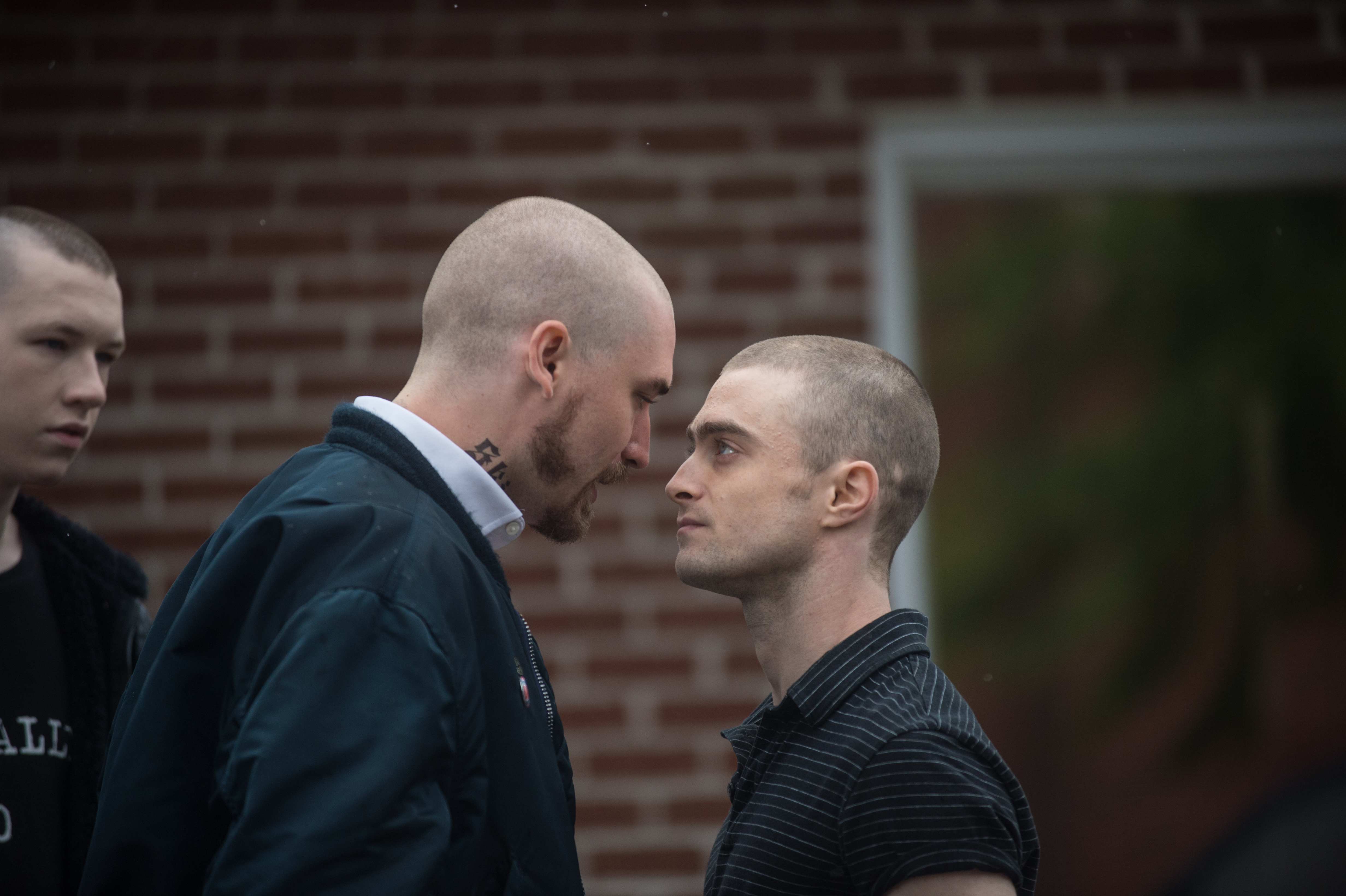 Daniel Radcliffe, right, in a scene from "Imperium," in which he plays an FBI agent going undercover as a neo-Nazi. (Lionsgate Premiere)