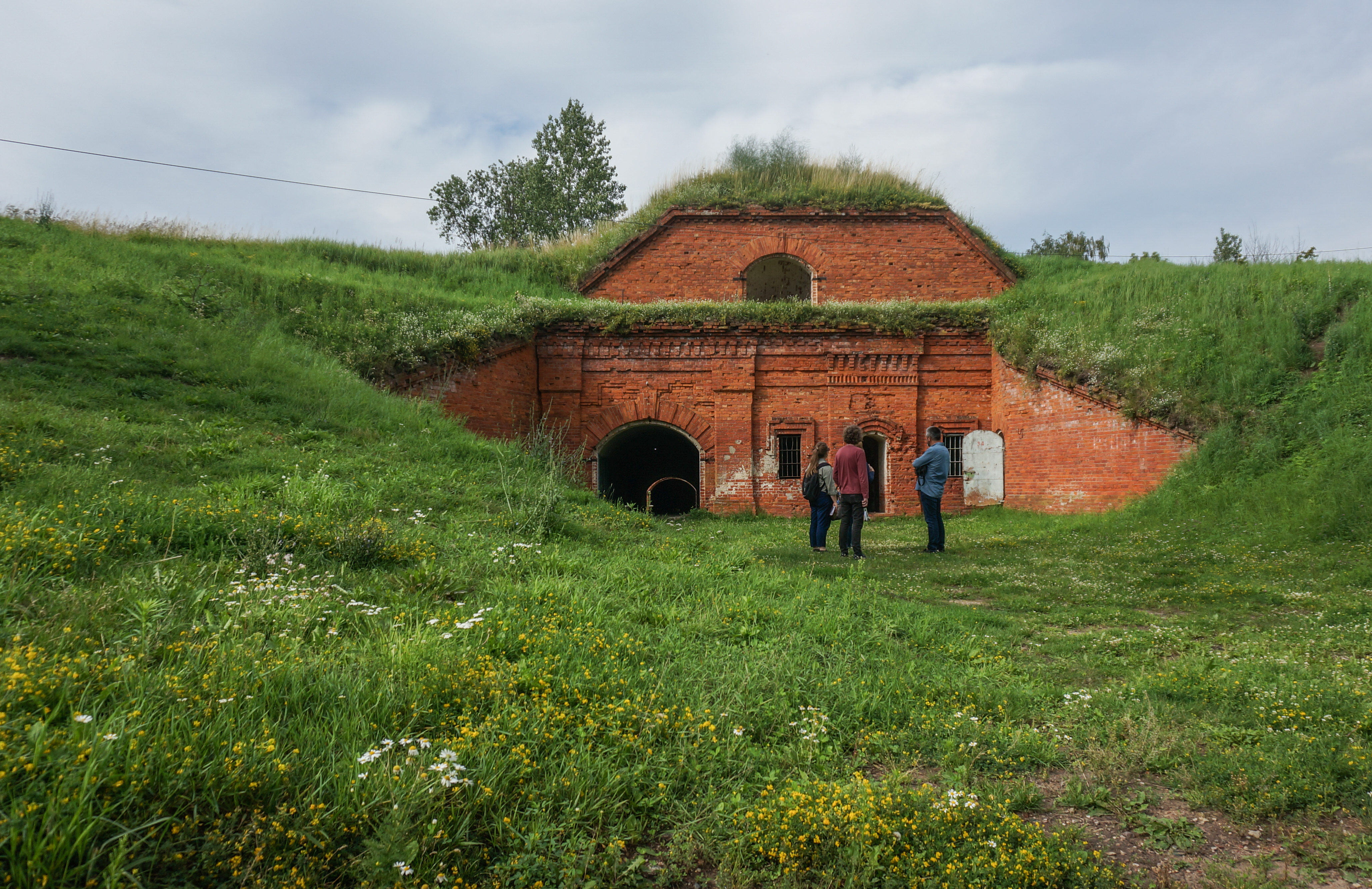 A film crew preparing to record at the former concentration camp known as the Seventh Fort in Kaunas, Lithuania, July 12, 2016. (Cnaan Liphshiz)
