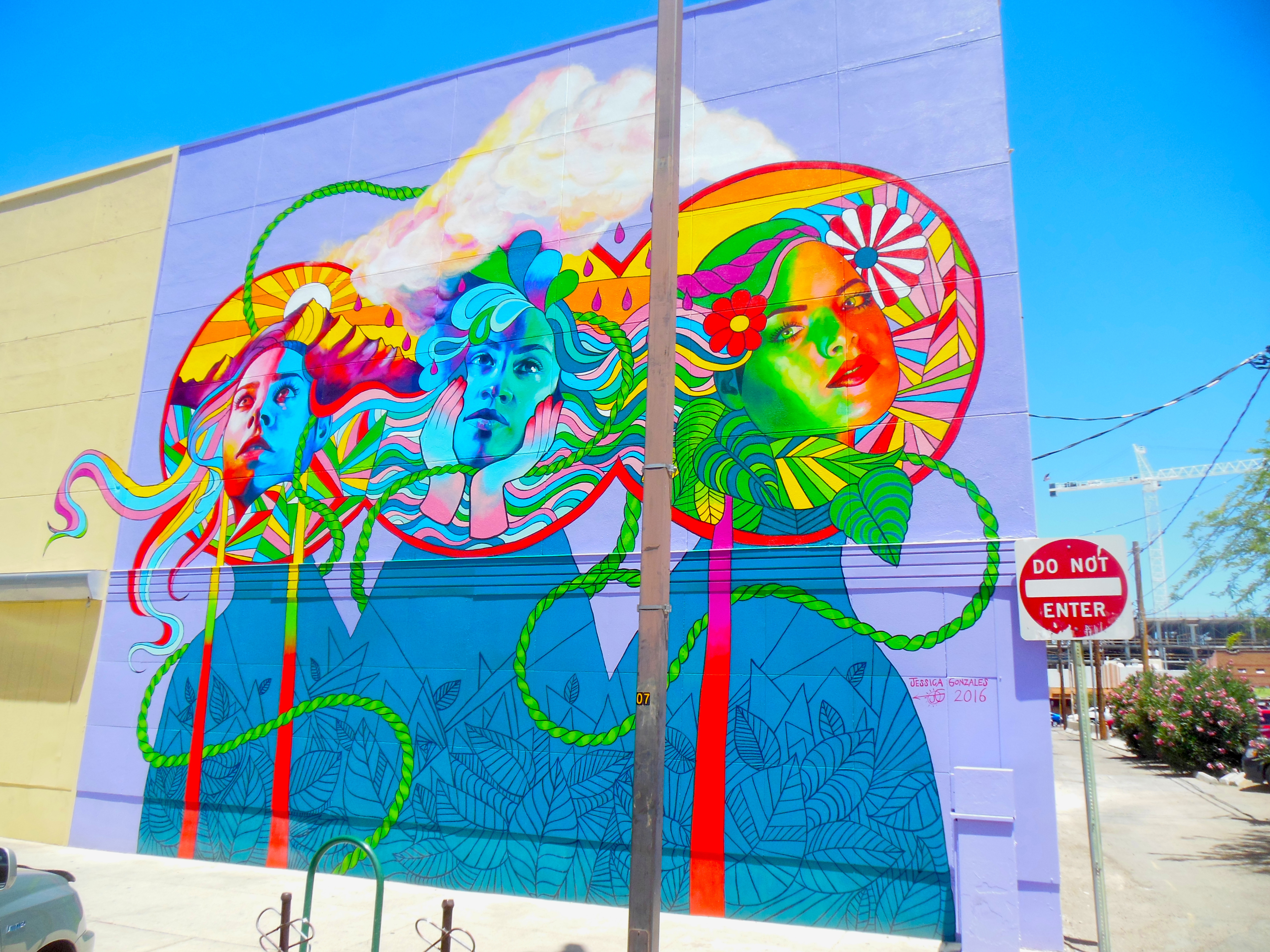 Jessica Gonzales painted the mural at Wig-O-Rama, 98 E. Congress. © 2016 Jessica Gonzales/Tucson Arts Brigade