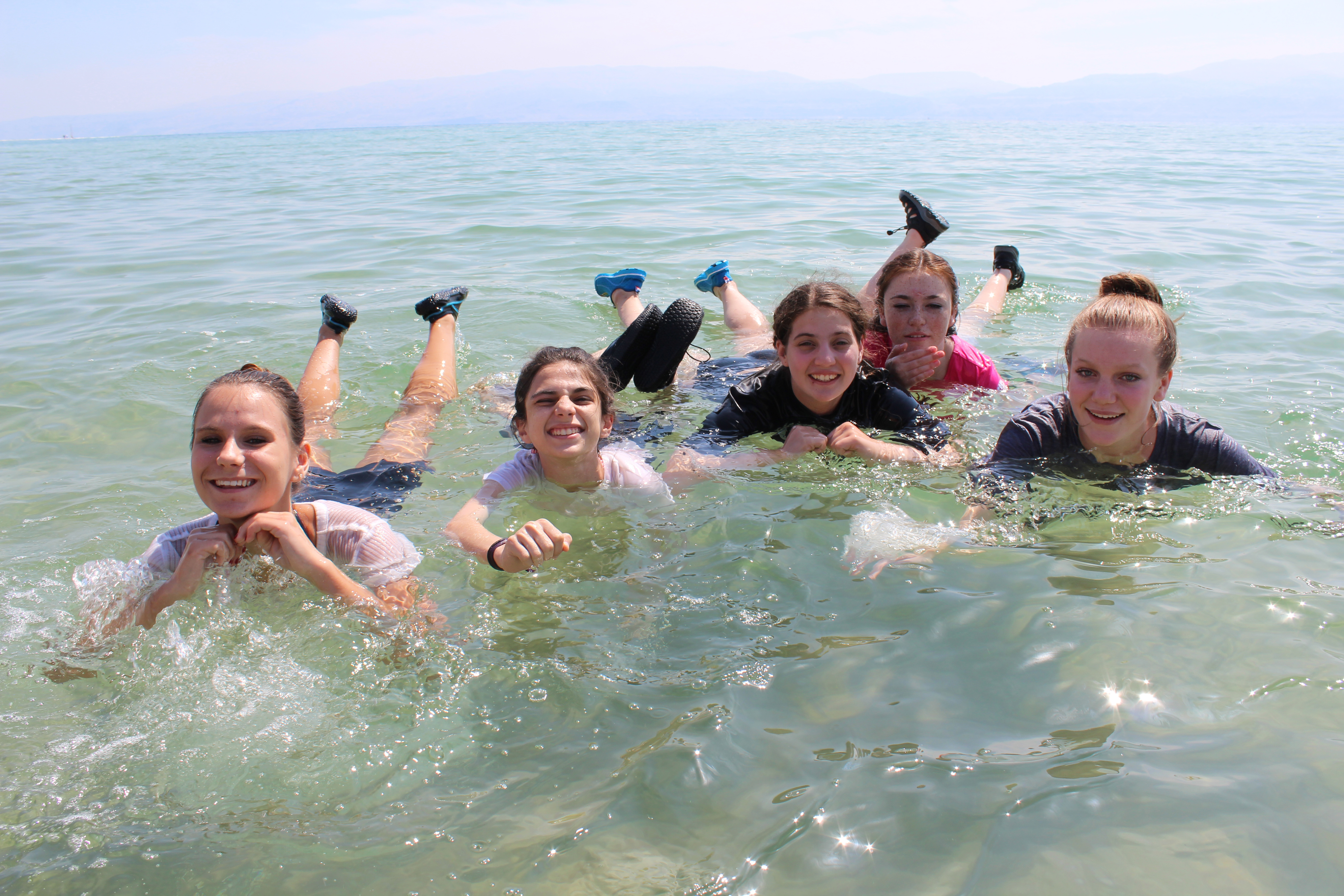 THA eighth graders enjoy the buoyancy of the salt-laden Dead Sea. (L-R): Eva Prouty, Ana Rosman, Lucila Thal, Katie Kanter and Lulu Youngerman (Jon Ben-Asher)