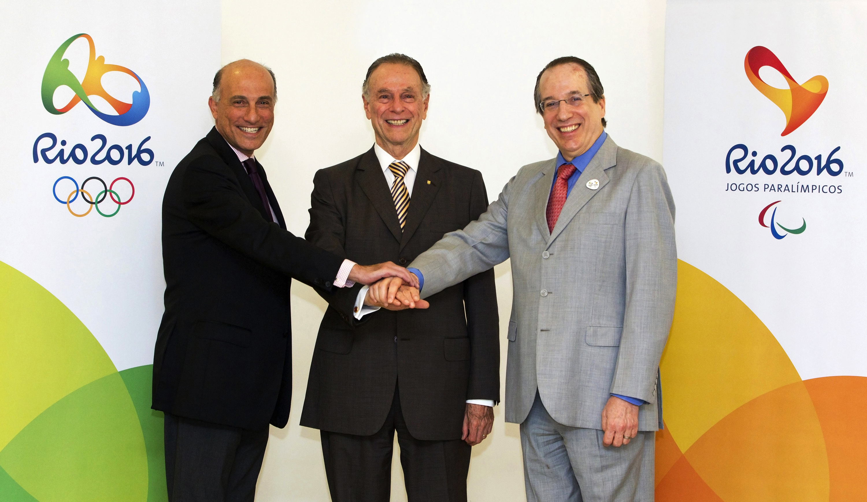 The Jewish trio in charge of the Rio Olympics: Carlos Arthur Nuzman is flanked by Sidney Levy, left, and Leonardo Gryner, Nov. 9, 2012. (Marcio Rodrigues)
