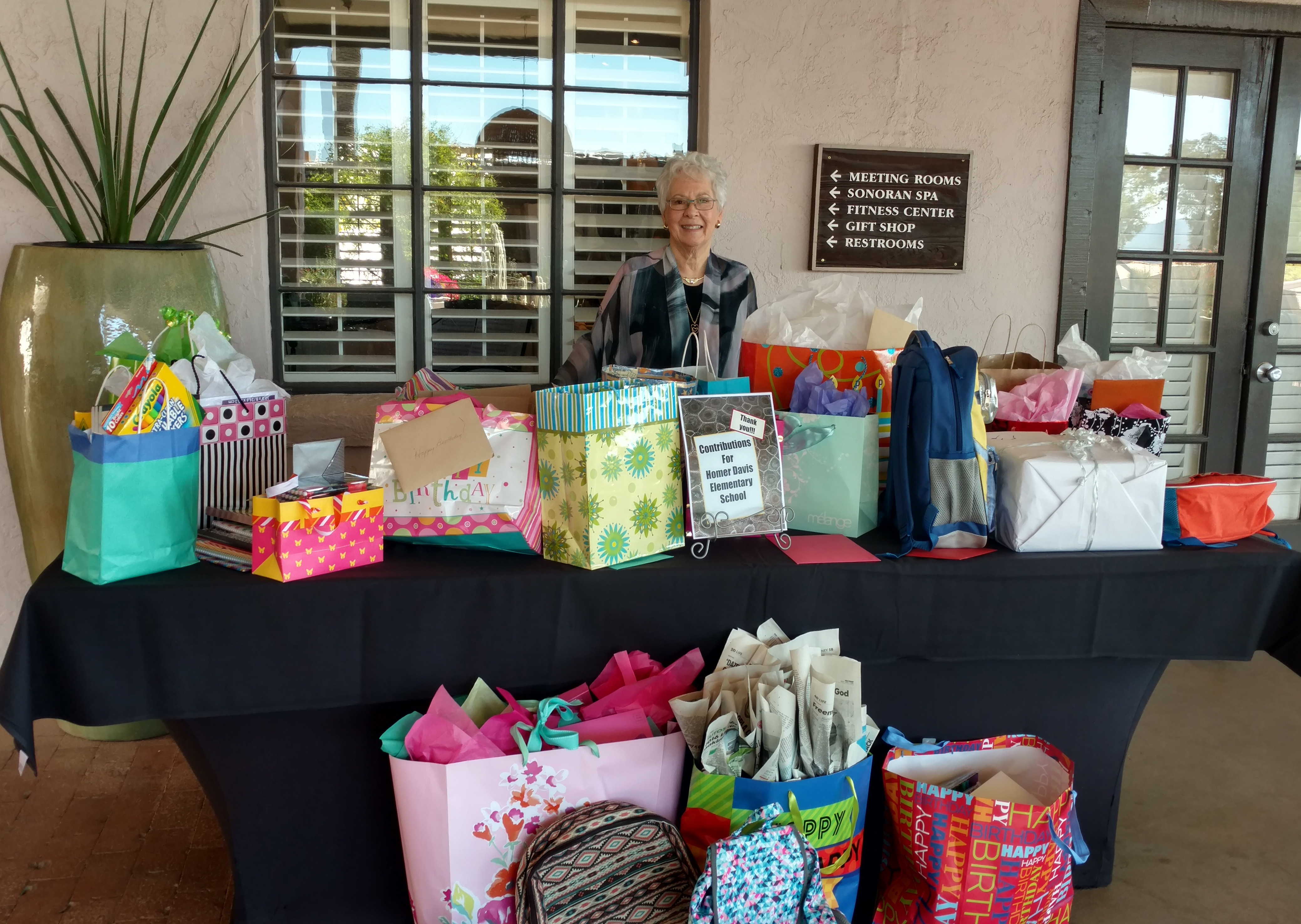 in focus  Loretta Berhmann HD Mom behind all the school supplies (2)