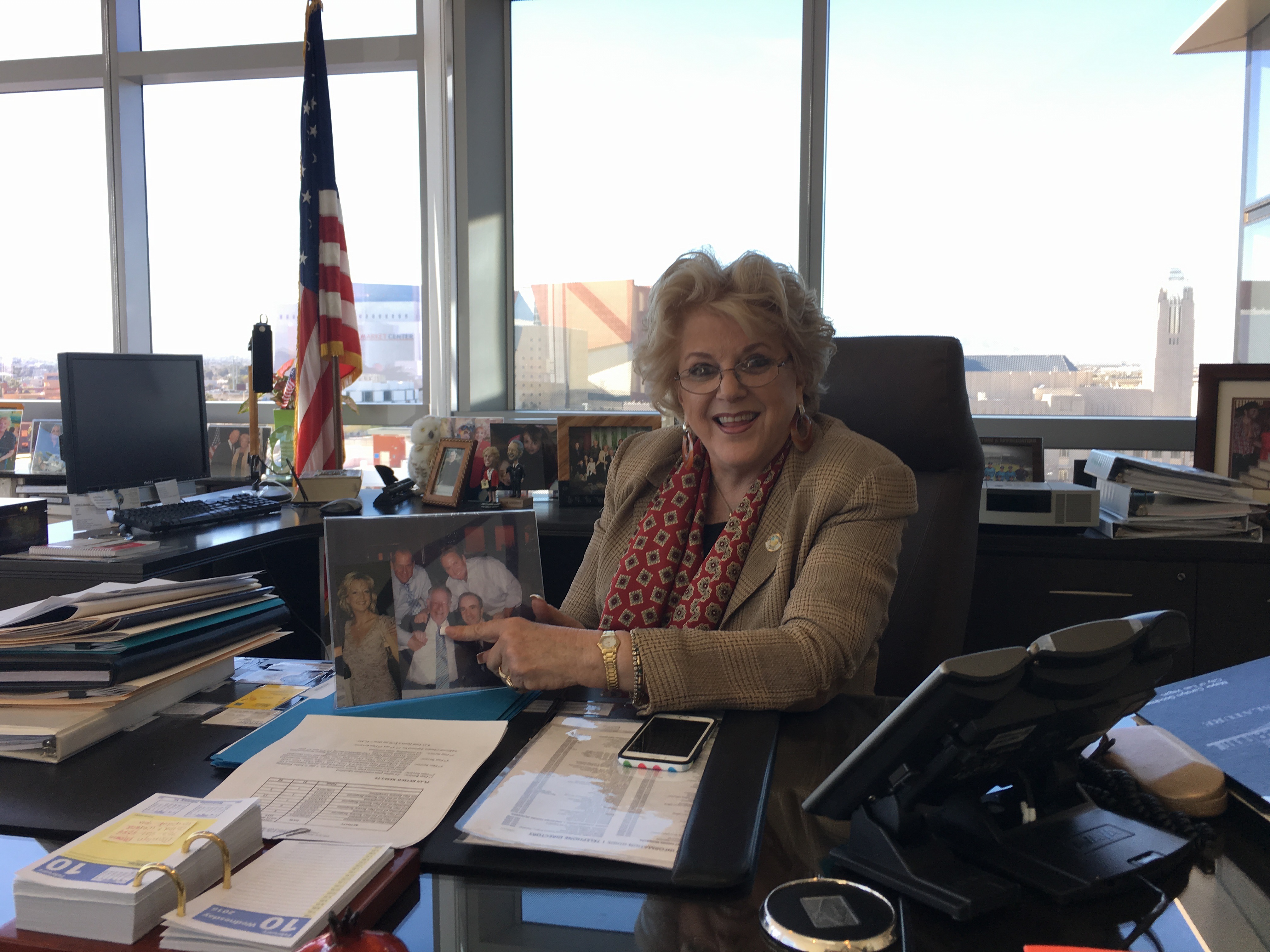 Las Vegas Mayor Carolyn Goodman, showing a family photo in her office, says the "Clinton names means a whole lot here," Feb. 10, 2016. (Ron Kampeas)
