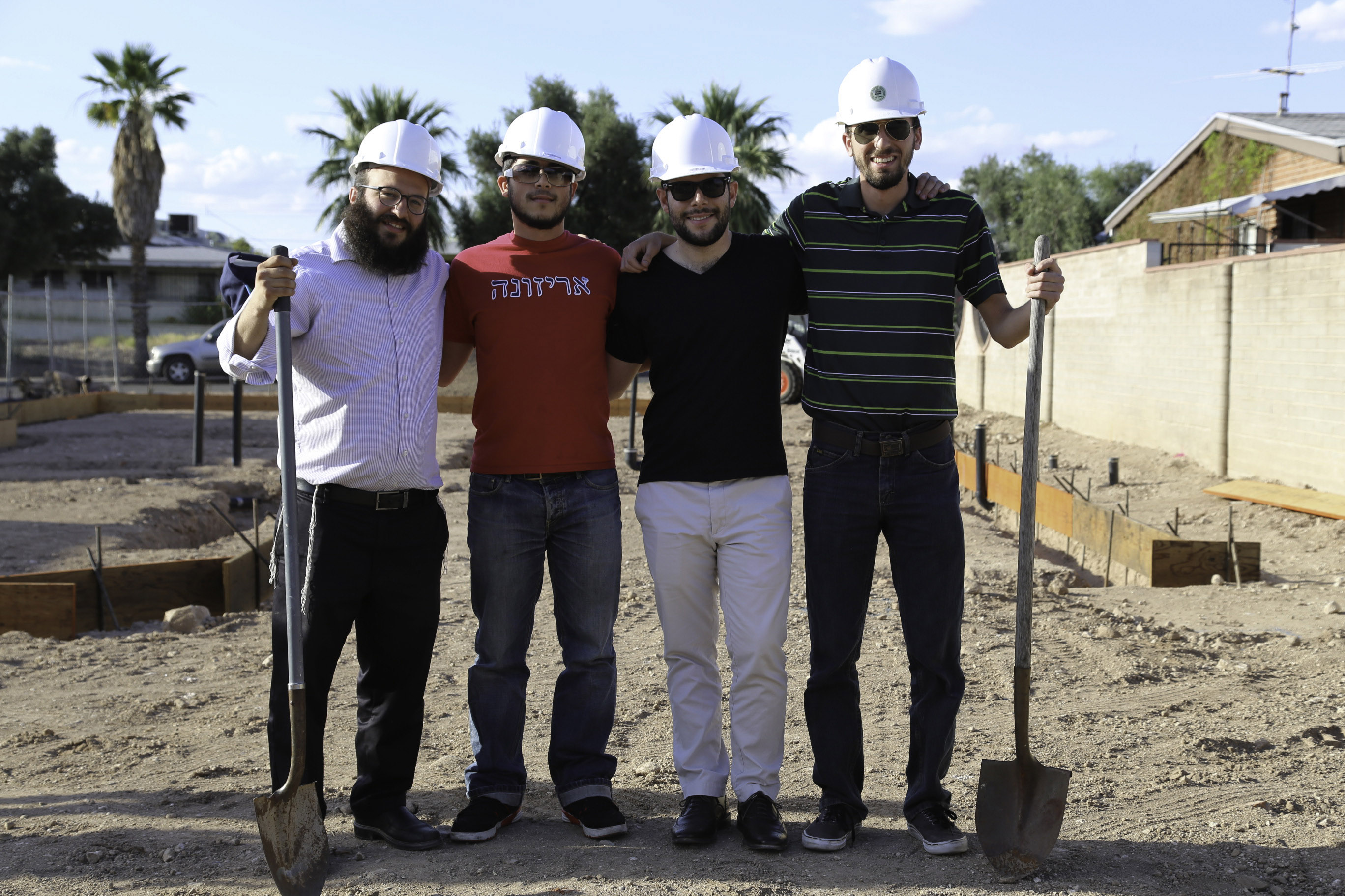 Rabbi Yossi Winner, Rony Mishiyev, Mat Friedman and Oren Lee at the Chabad UA house groundbreaking. (Courtesy Chabad UA)