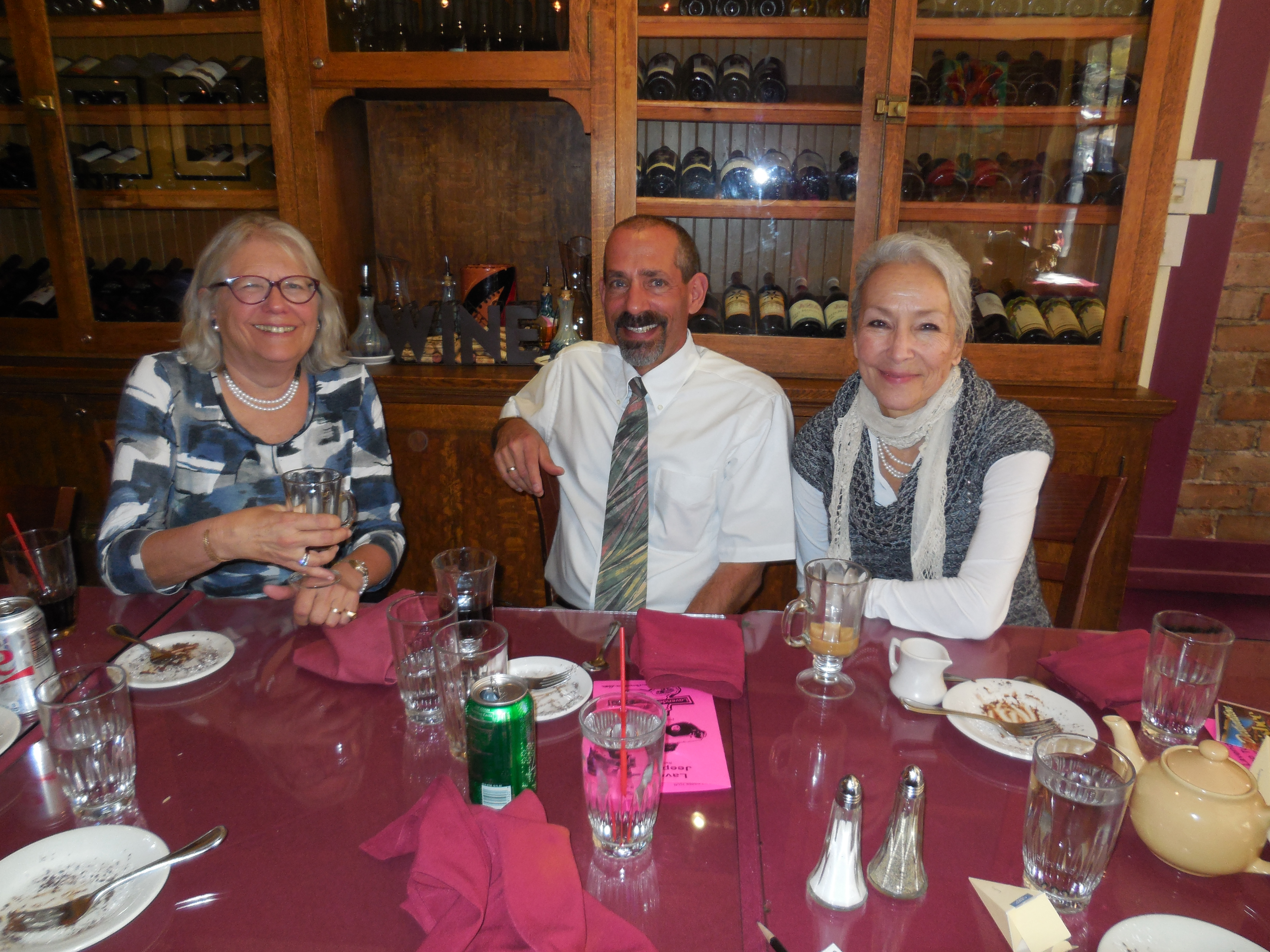 Bisbee residents (L-R): attorney Anne Reiniger, realtor Bob Klein and tourism promoter Cristina Plascencia at Café Roka in Bisbee