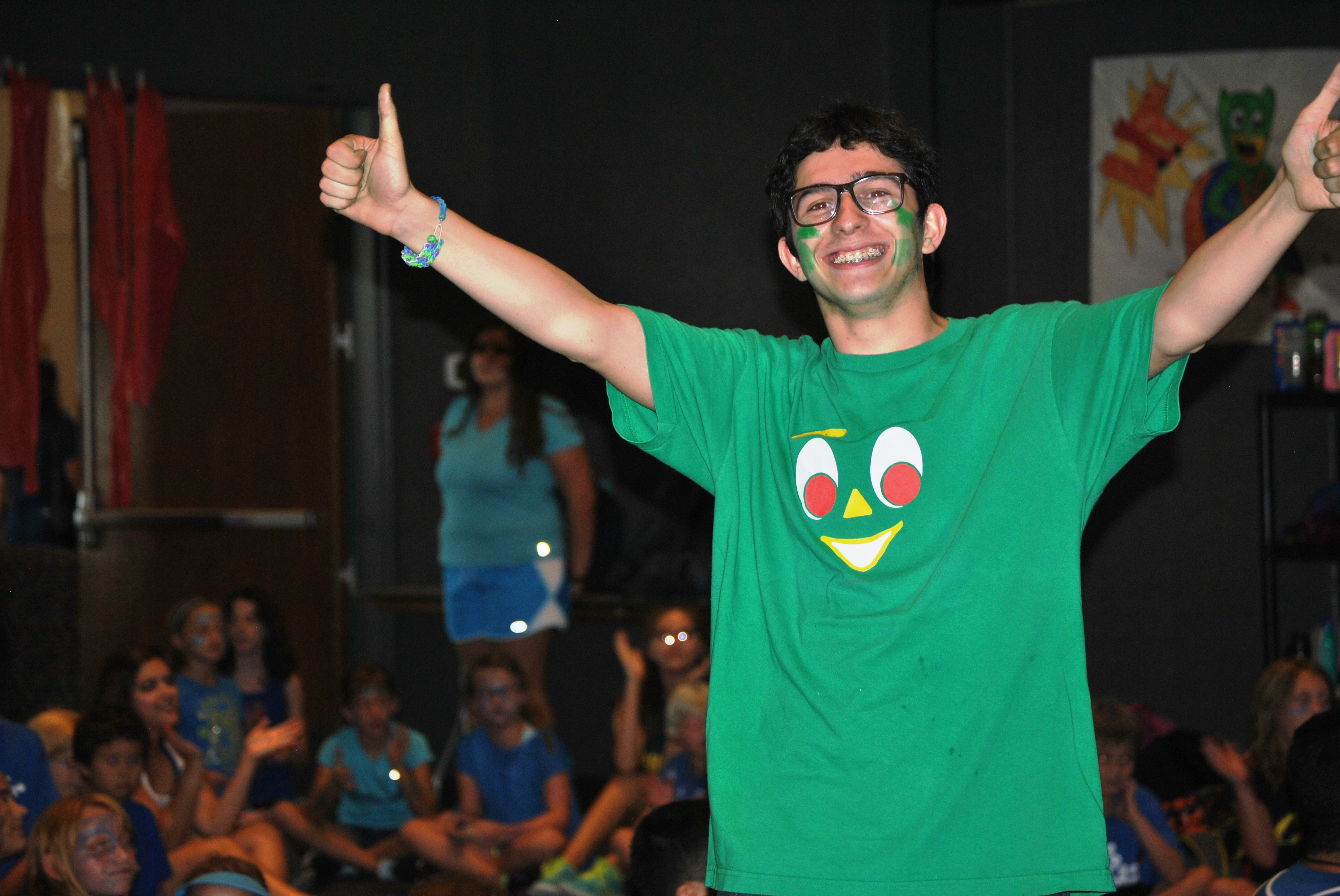 Avi Szychter rallies campers during the Camp J Maccabiah games in July. (Julie Zorn/TJCC)