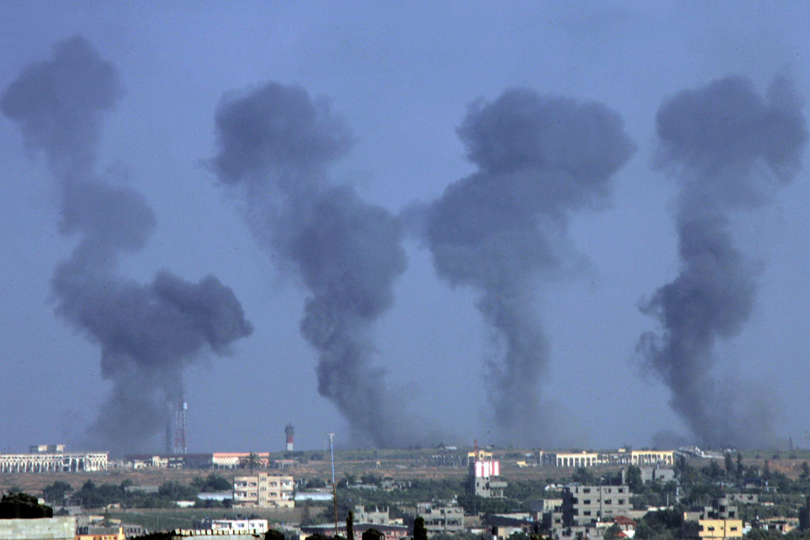 Black smoke rises following an Israeli airstrike on the Gaza International Airport in Rafah, July 7, 2014. (Abed Rahim Khatib/Flash 90)