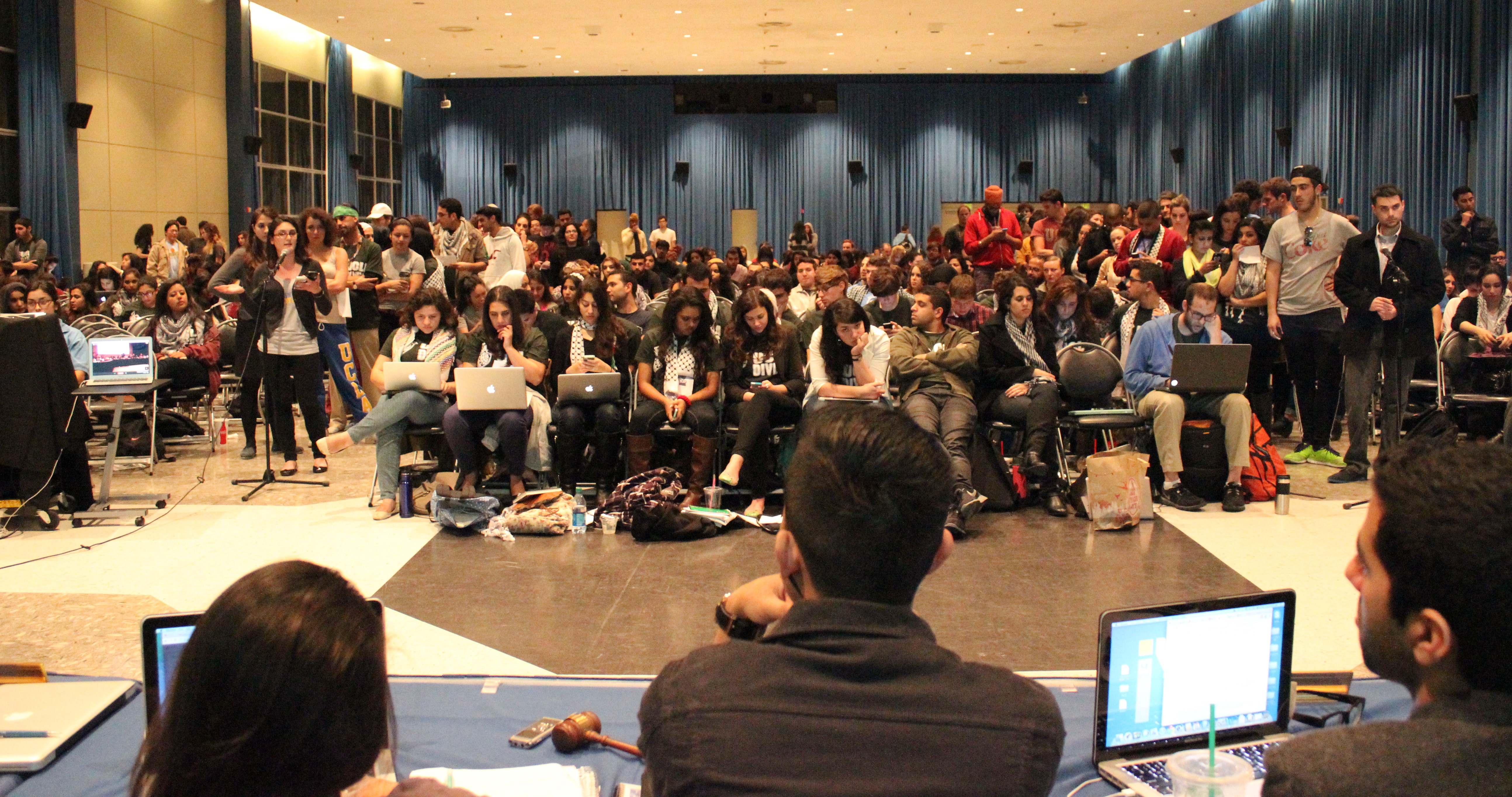 Members of UCLA's student government listen to supporters and opponents of a divestment resolution targeting Israel in a session that stretched into the early morning hours of Feb. 26, 2014. (Courtesy of StandWithUs)