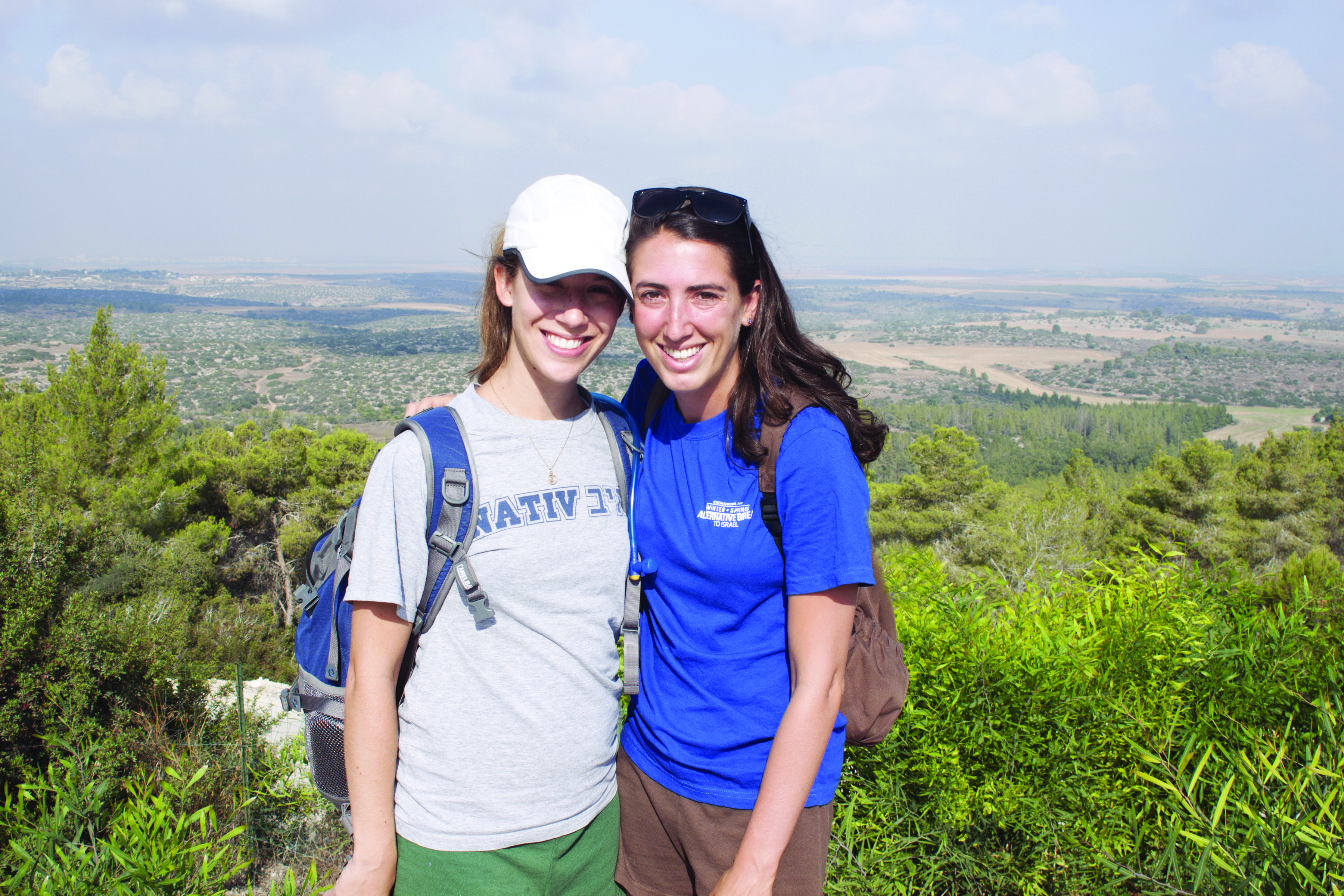 Efrat Shahar (left) and Bryce Megdal hike near Jerusalem. 