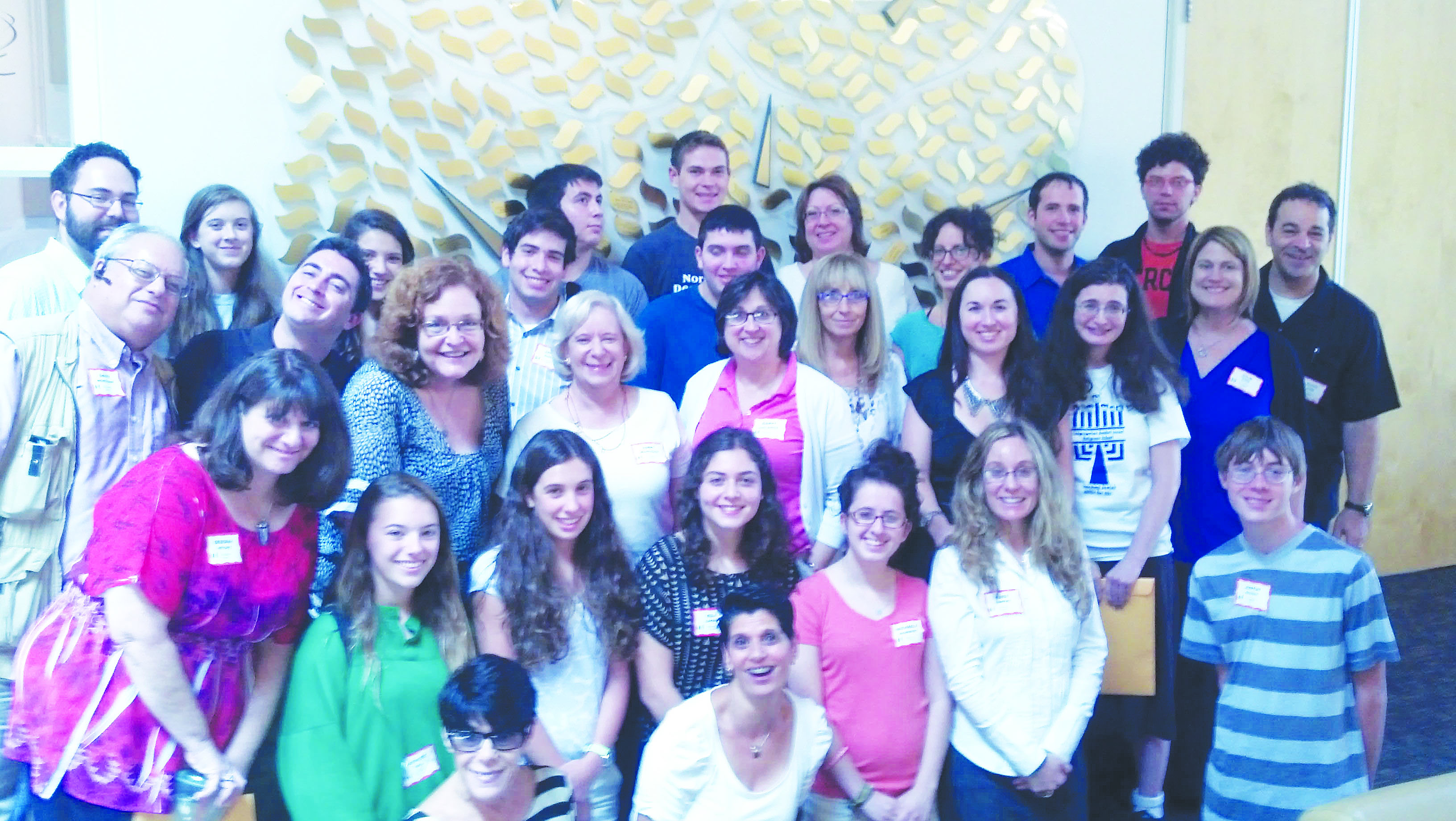 Tucson Jewish educators at a statewide conference in Phoenix Aug. 11. Bottom row (L-R): Teena Serlachini (Congregation Or Chadash), Rina Liebeskind (Or Chadash education director/Hebrew High); second row: Deborah Witchey  and Ashley Hall (Or Chadash), Maya Collier, Hila Lamdan, Michaela Davenport and Page Confino (Congregation Chaverim), Justin Iaconis (Or Chadash); third row: David Weintraub (Or Chadash), Jason Moore (Chaverim), Cantor Janece Cohen and Cindy Weintraub (Or Chadash), Nancy Auslander (Congregation Anshei Israel), MeMe Aguila (Anshei Israel/Chaverim), Naomi Present (Chaverim education director), Daniella Bardack (Anshei Israel), Julie Unger Zorn and Scott Zorn (Or Chadash); fourth row: Oren Riback, Lily Peters, Rebecca Groff, Jared Erman and Caleb Groff (Or Chadash), Renee Hulsey (Anshei Israel), Noga Panai (Or Chadash/Hebrew High), Rabbi Ben Herman (Anshei Israel education director), Bryan Gordon (Anshei Israel); fifth row: Ariel Nadler (Or Chadash), Devin Hulsey (Anshei Israel)
