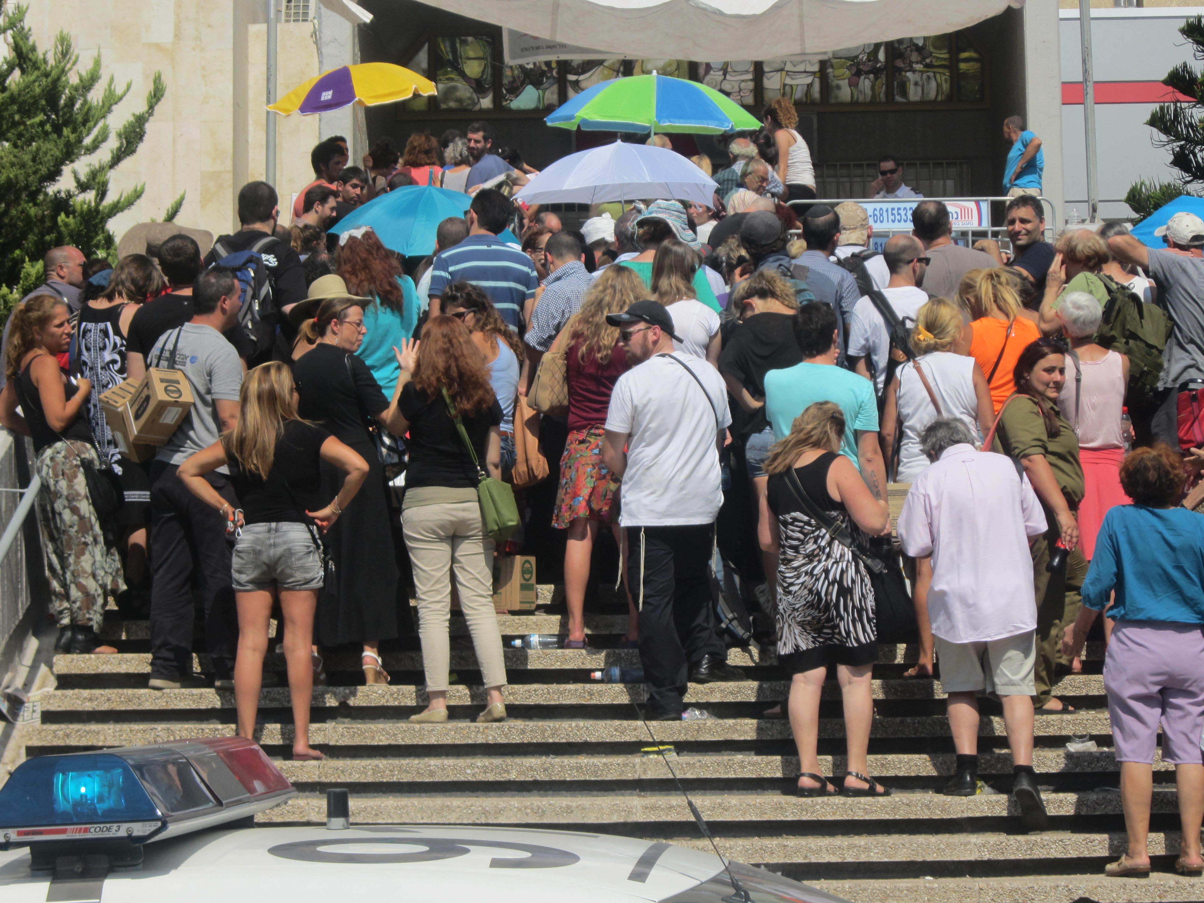 Israelis flocking to a southern Tel Aviv post office to receive free gas masks -- a scene being played out throughout Israel amid fears of an attack by Syria. (Ben Sales)