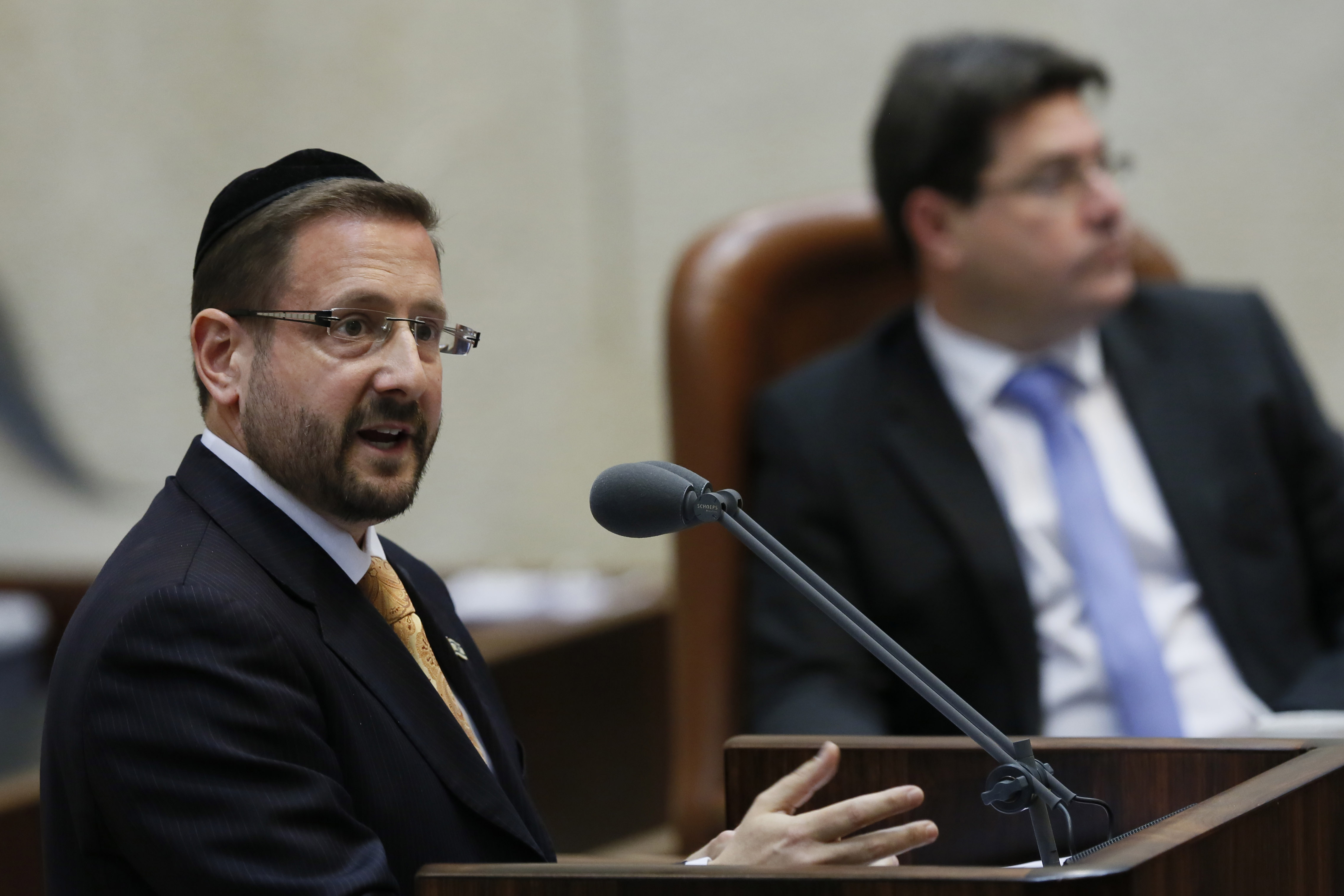 Dov Lipman, an American-born haredi Orthodox Knesset member for the centrist Yesh Atid party, speaking on the Knesset floor, March 2013. (Miriam Alster/Flash90/JTA)
