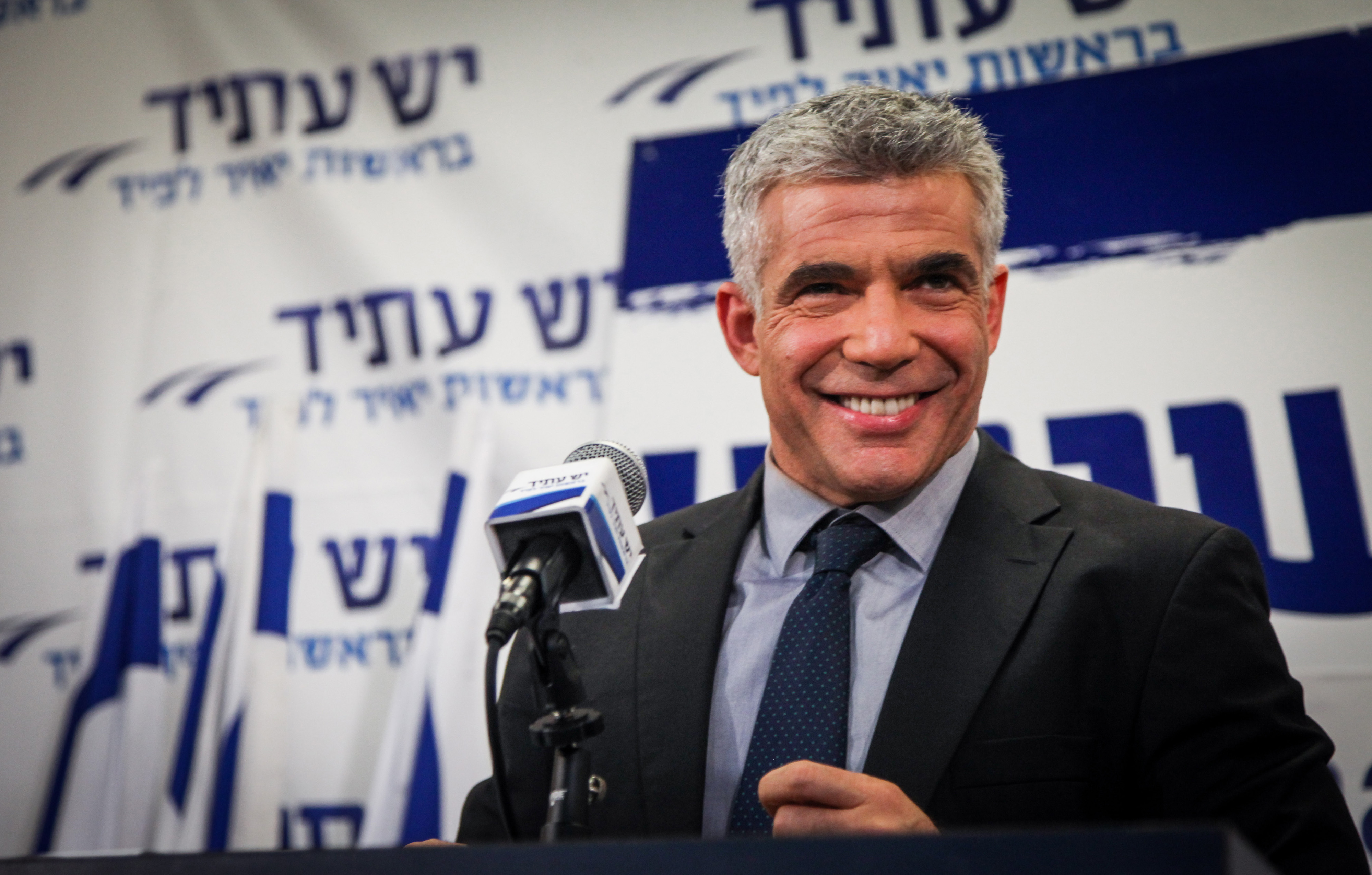 Yesh Atid chief Yair Lapid addressing party supporters in Tel Aviv following the release of exit poll results from the Israeli elections, Jan. 22, 2013. (Avishag Shaar Yashuv/Flash 90/JTA)