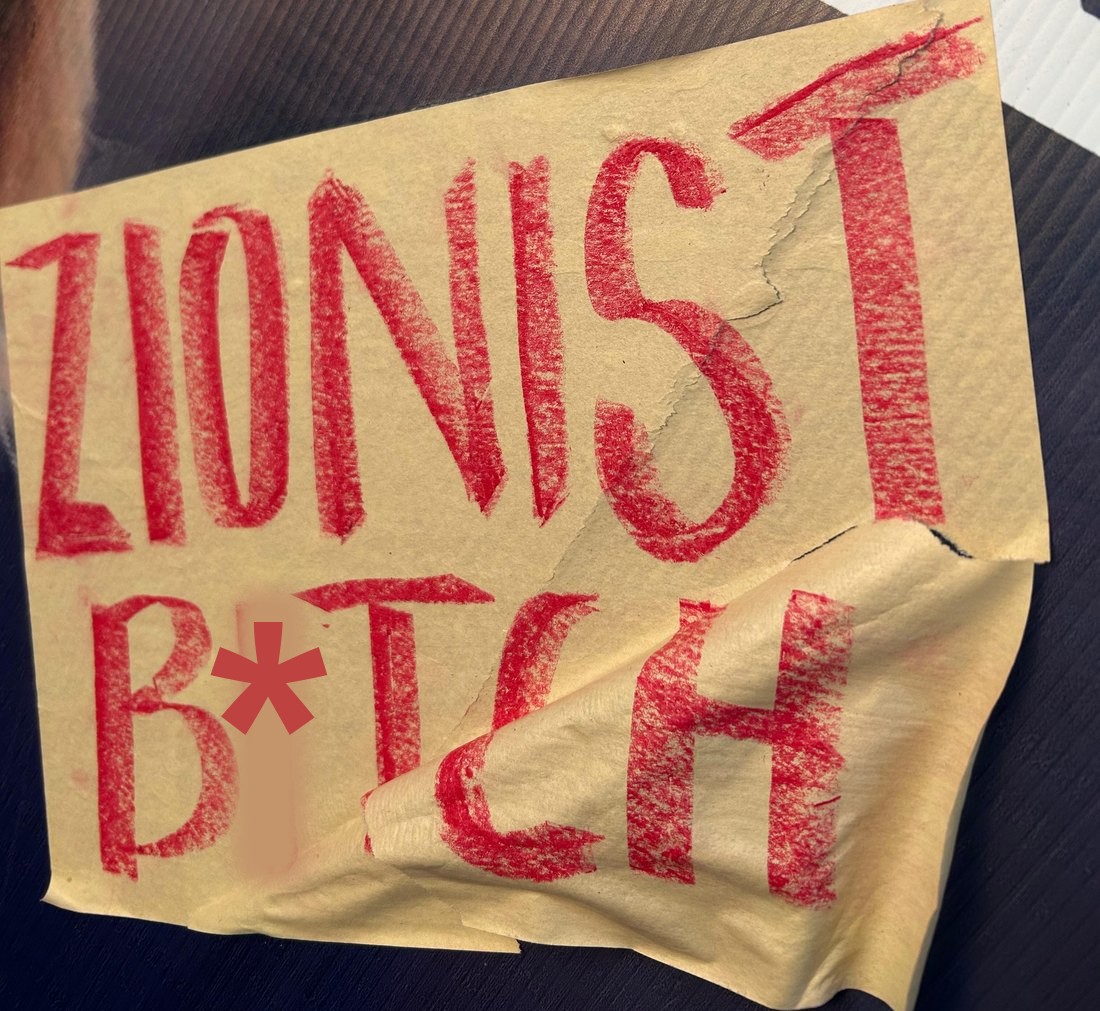 Close-up of the placard bearing the slur